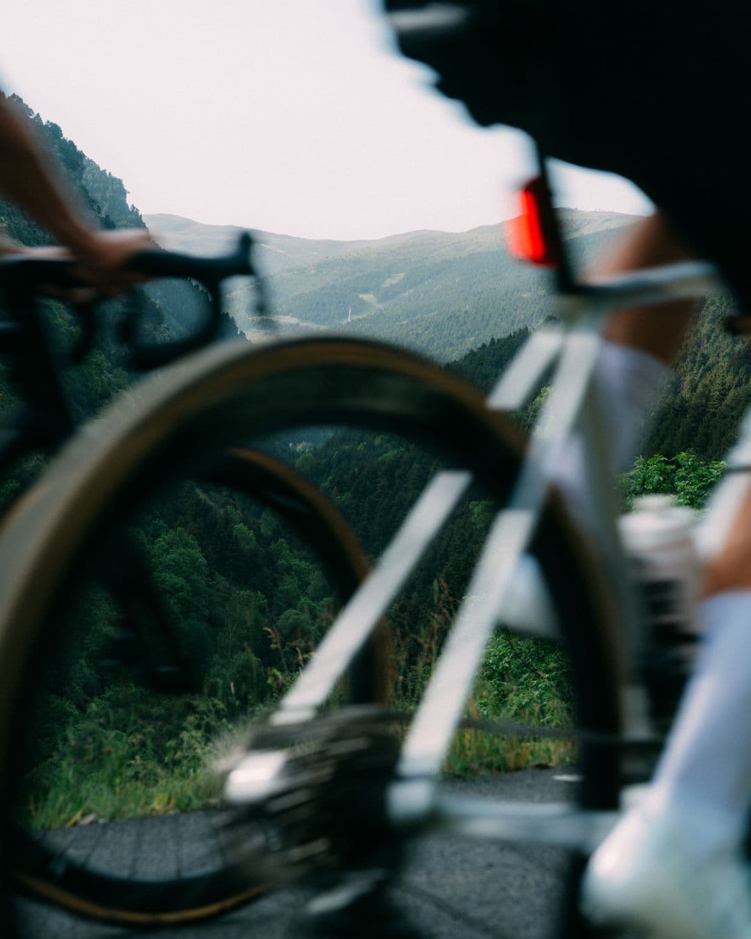 Cyclists climbing a mountain road